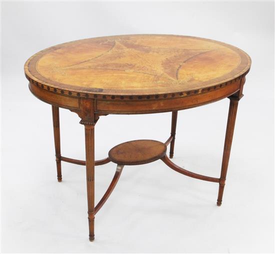 A Sheraton revival oval satinwood and tulipwood crossbanded marquetry inlaid centre table, W.3ft 5in.